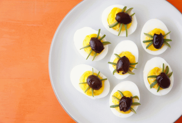 Make these spider deviled eggs for your Halloween-themed dinner