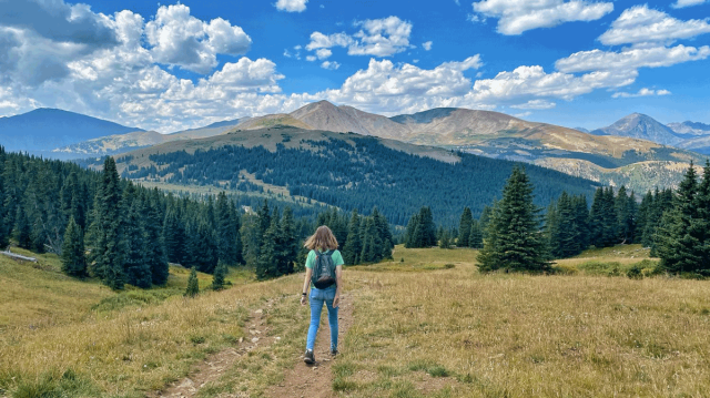 teen girl hiking in the mountains above Breckenridge