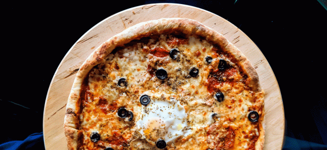 A close up on a homemade pizza, which can become a family tradition to make at home