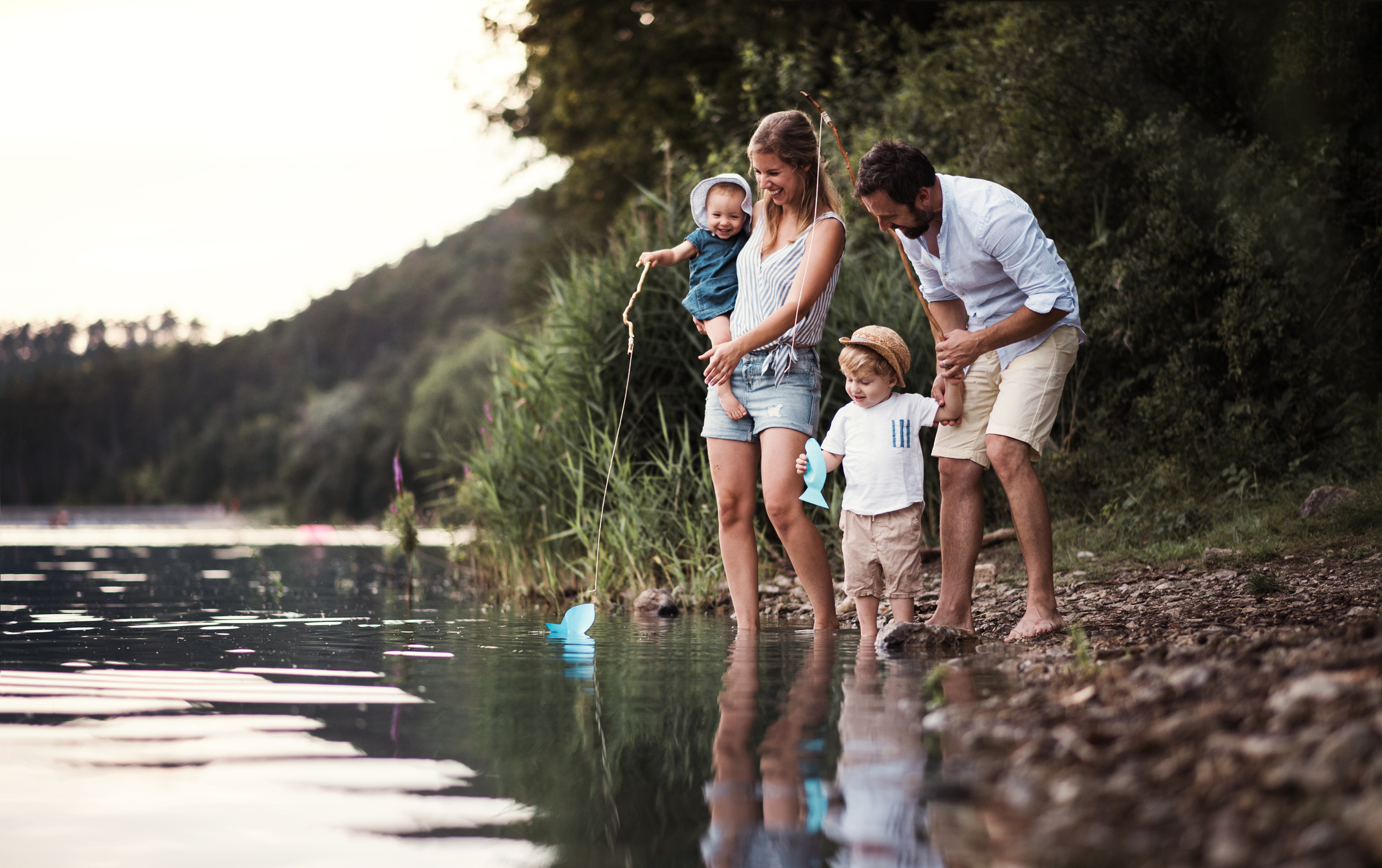 Family Hiking On Summer Vacation In Mountains Stock Photo - Download Image  Now - Hiking, Child, Friendship - iStock