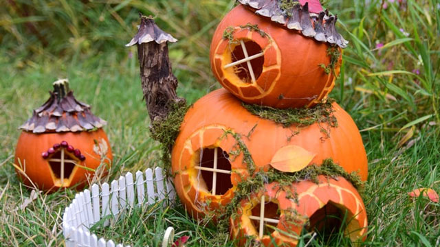 an idea for what to do with pumpkins after halloween is to make a fairy house