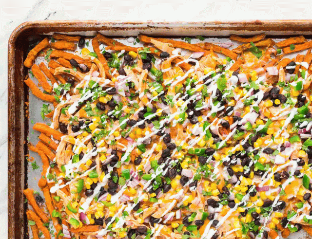 A sheet pan of chicken enchiladas, made as a quick and easy dinner