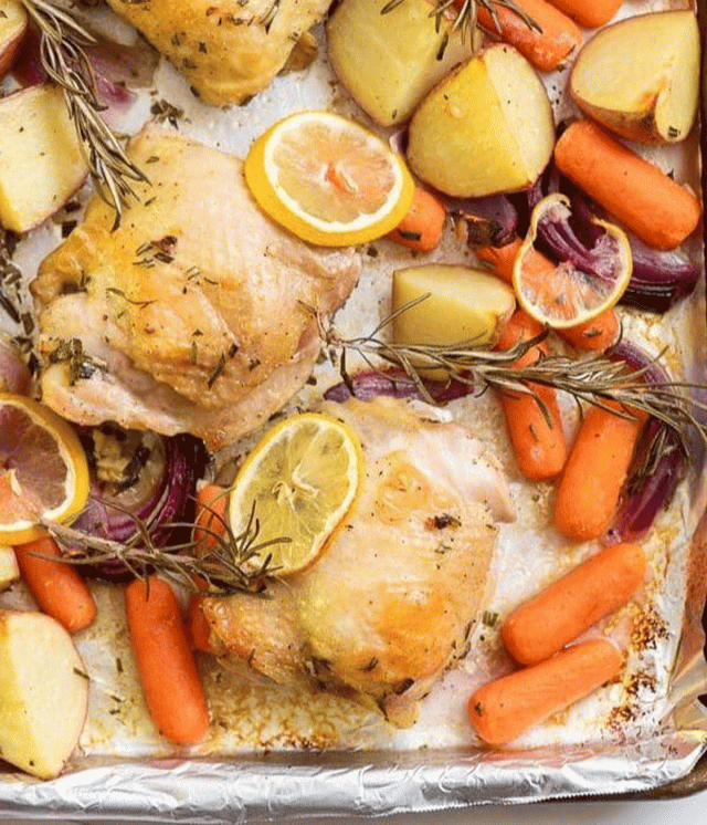 Lemon rosemary sheet pan chicken thighs with veggies are ready to be served