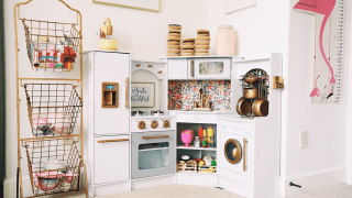 a three-tiered rack is a good storage hack for play kitchen food