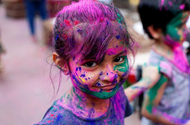 little girl at a Holi celebration