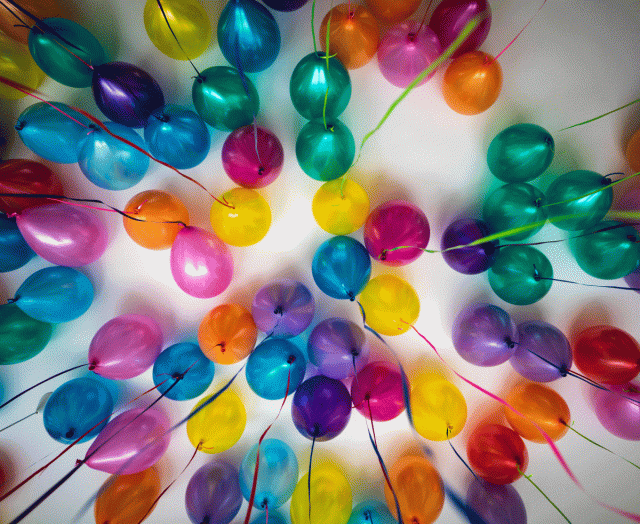 An array of different colored balloons, perfect for any gender neutral birthday party idea