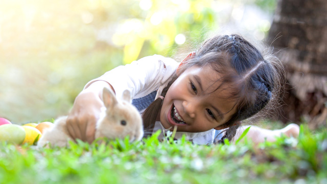 little girl with a bunny