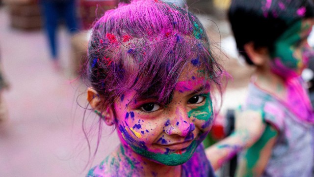 little girl at a Holi celebration