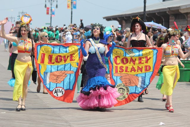 people walking in the coney island mermaid parade