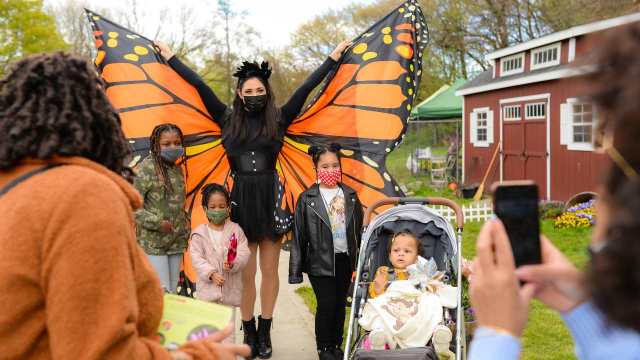 woman as butterfly and kids at Queens Botanical Garden Flower Patch