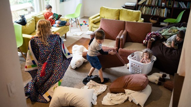 kids in a messy living room