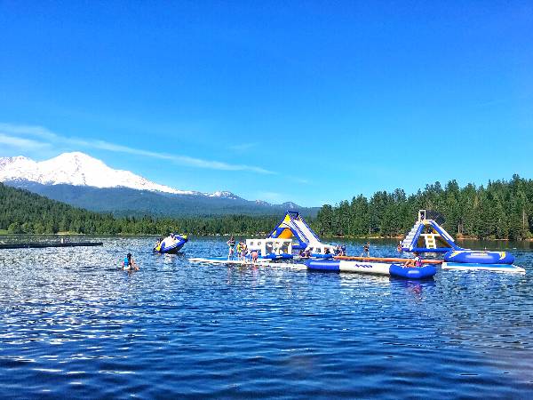 a lake with inflatables