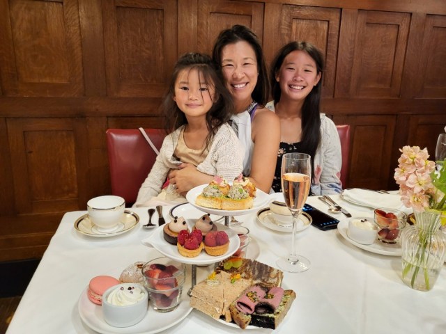 A mom and her two daughters enjoy afternoon tea at the St Francis Westin