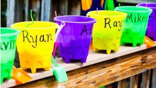 personalized buckets are a fun party favor idea for kids