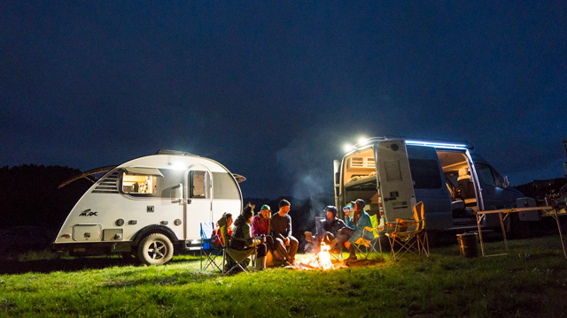 campers in an RV using road trip hacks