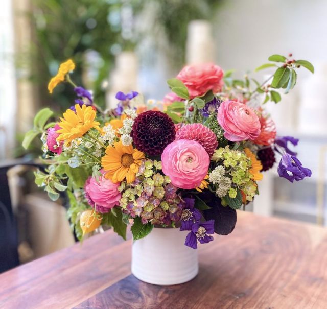 Beautiful wildflowers of purple, pink, yellow and white in a vase