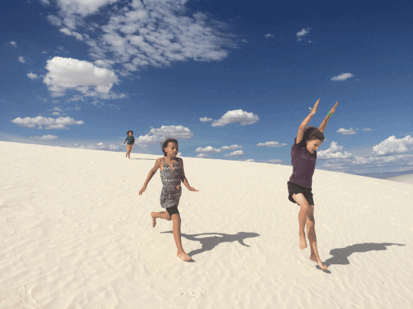 Kids at White Sands National Park for family road trip