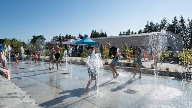 Kids splash at a new eastside sparyparks and beaches, Feriton Spur Park