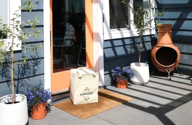 Groceries left on a doorstep by Kinfood, a local seattle delivery services