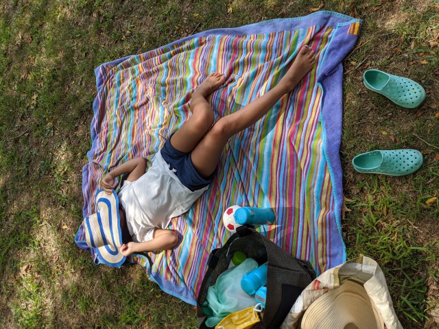 girl on picnic blanket in NYC park 