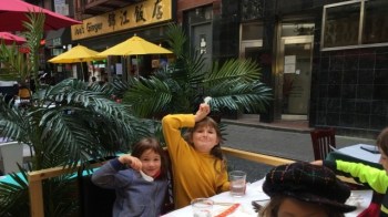 Kids eating outside in Chinatown