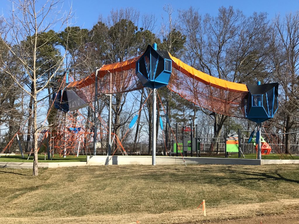Colorful climbing structures at Fairlington Playground in Arlington
