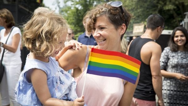 mom and daughter celebrate pride events activities together