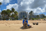 boy playing on beach on puerto rico family vacation at Wyndham Grand Rio Mar