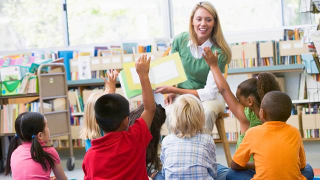 kids sit and listen during storytime, free things to do