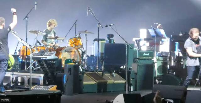 teenager drums at Pearl Jam concert