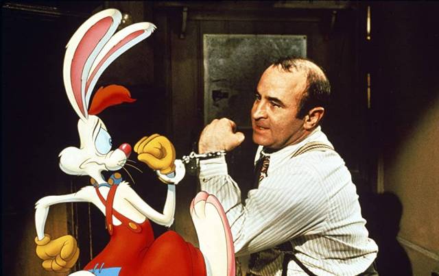 A man is handcuffed to Roger Rabbit
