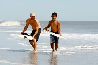 Skimboard champion giving lessons at Dewey Beach