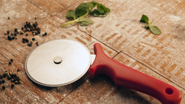 using a pizza cutter on herbs is a clever cooking hack