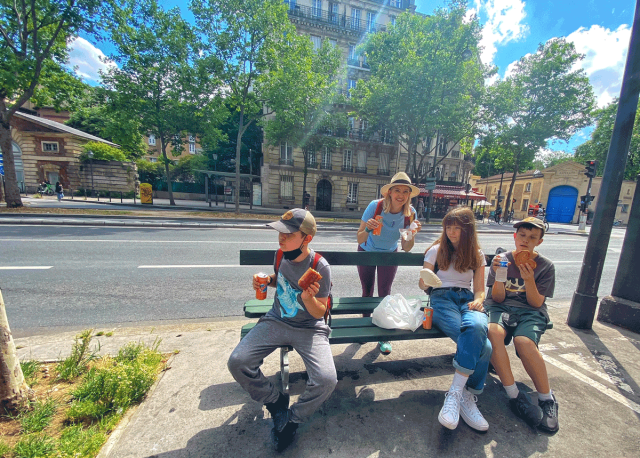 Paris with kids eating pastries