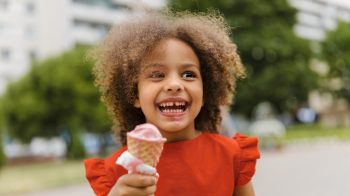 little girl eating the best ice cream in dallas