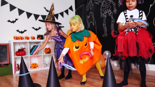 girls playing halloween party games