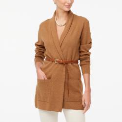 woman in tan cardigan with a tan belt and beige pants