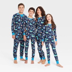 family of four in Hanukkah pajamas