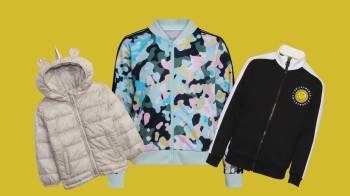 three kids' jackets against yellow background