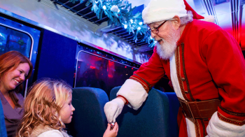 Santa and kids on polar express holiday train