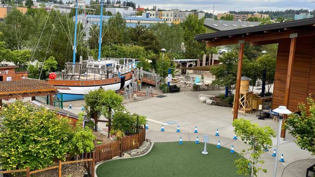 the outdoor playspace at Olympia Hands On Children's Museum includes a pirate ship and tricycle bike lane