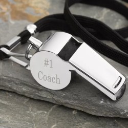 Silver coach's whistle on black lanyard