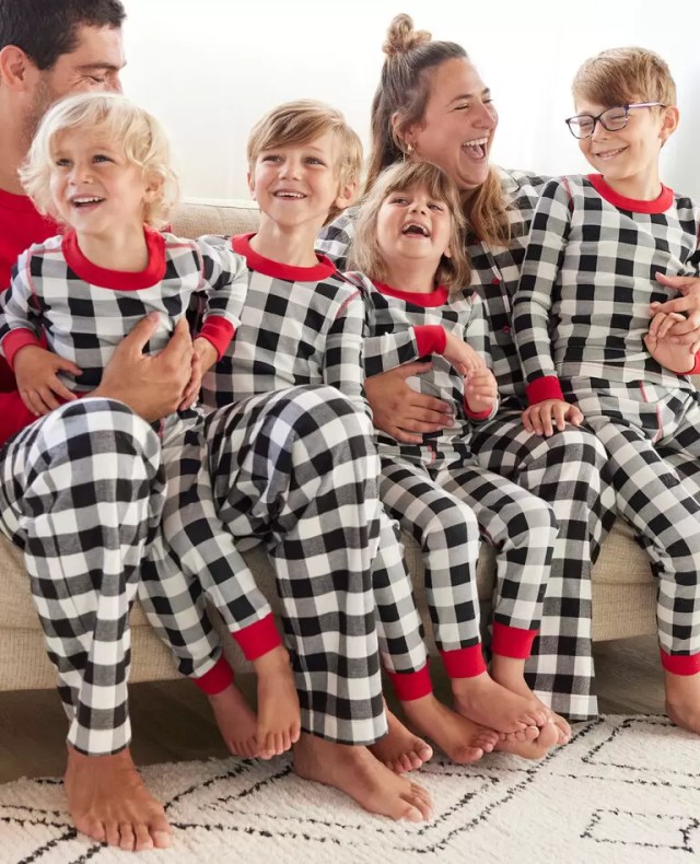 Family in matching plaid pajamas.