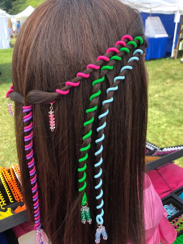 Brown hair with multi-colored hair wraps