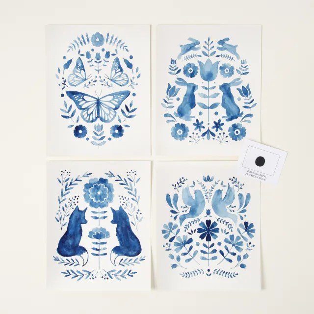 Set of four blue-based watercolor images