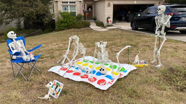 Family Creates a New Skeleton Scene on Their Lawn Every Day of October