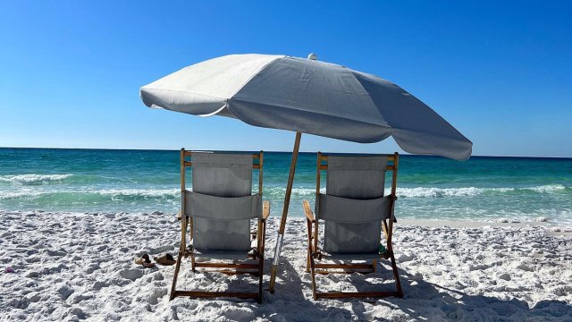 Beach chairs on white sand beaches of Destin, Florida