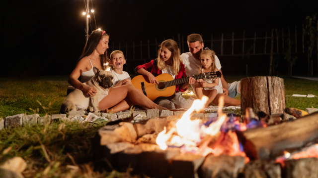 family at a bonfire party