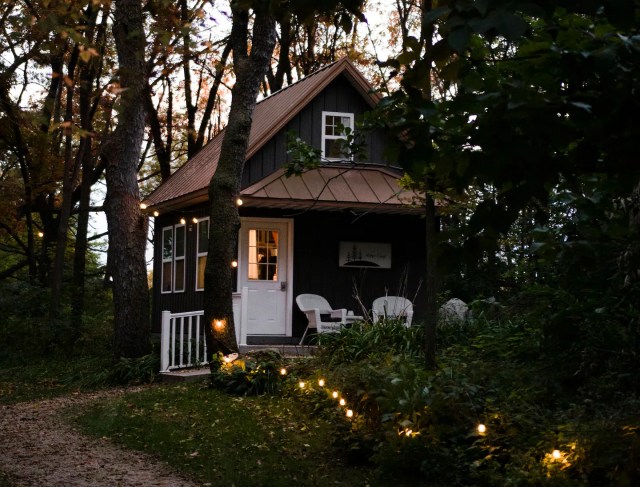 dark cottage in the woods