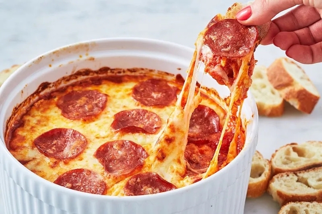 Pizza dip is a good birthday party snack for teens.